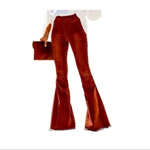 NWOT Bell Bottom, Rust color jeans, size Large